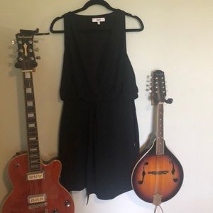 Likely black mini dress